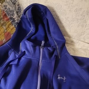 Under Armour jacket, worn only a few times, in perfect shape, Purple in color,